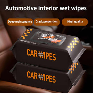 Stacks of black packages labeled Car Interior Cleaning Wipes sitting on a brown leather car seat, highlighting automotive interior wet wipes for deep maintenance and crack prevention