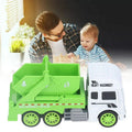 Father and toddler playing with green and white heavy machinery toy garbage truck